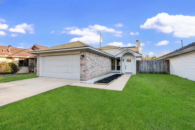 single story home featuring a garage and a front yard