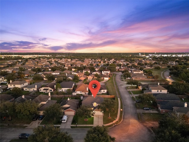 view of aerial view at dusk