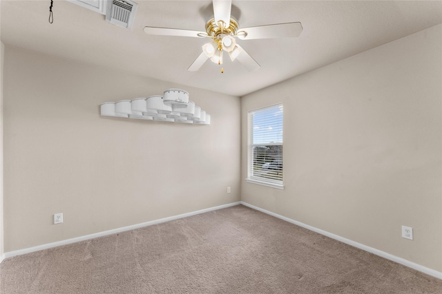 unfurnished room with carpet floors and ceiling fan