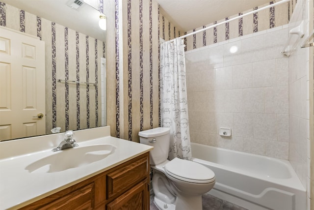 full bathroom with vanity, toilet, and shower / bath combo