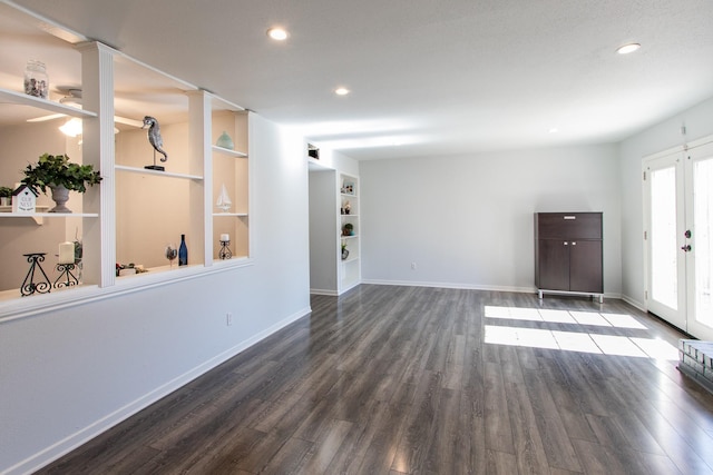 interior space featuring french doors, dark wood-type flooring, recessed lighting, and baseboards