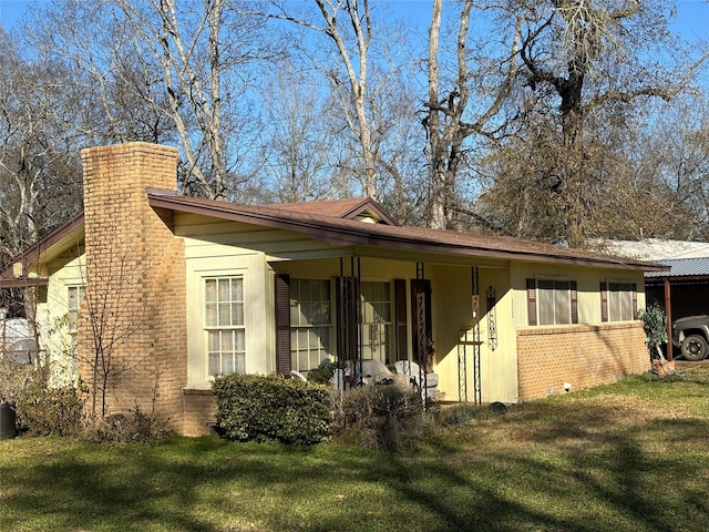 exterior space featuring a front lawn