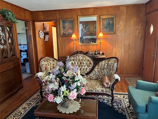504 E Bell Ave, Crockett, TX 75835 - living room with wood finished floors and wood walls