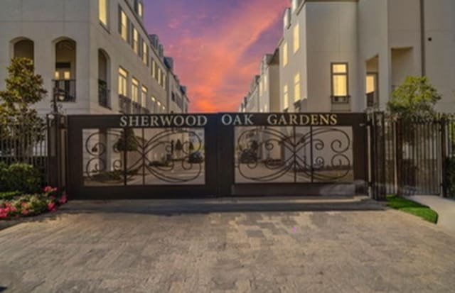 view of gate at dusk