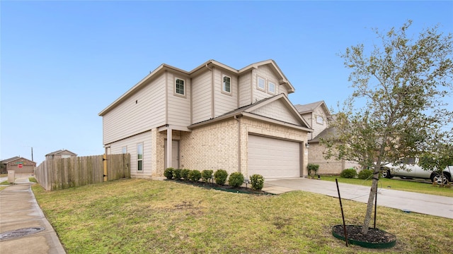 view of front of house with a garage and a front lawn