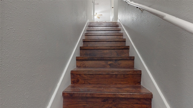 stairs with a textured wall