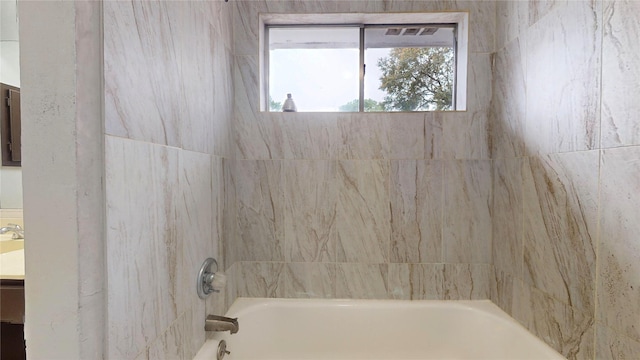 bathroom featuring shower / bath combination