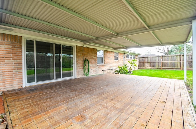 wooden deck with a yard