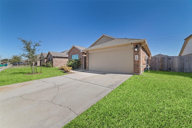 ranch-style house with a garage and a front yard