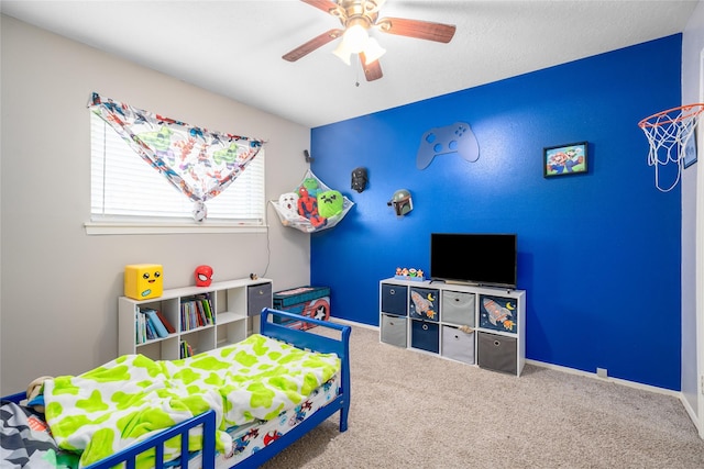 carpeted bedroom with ceiling fan