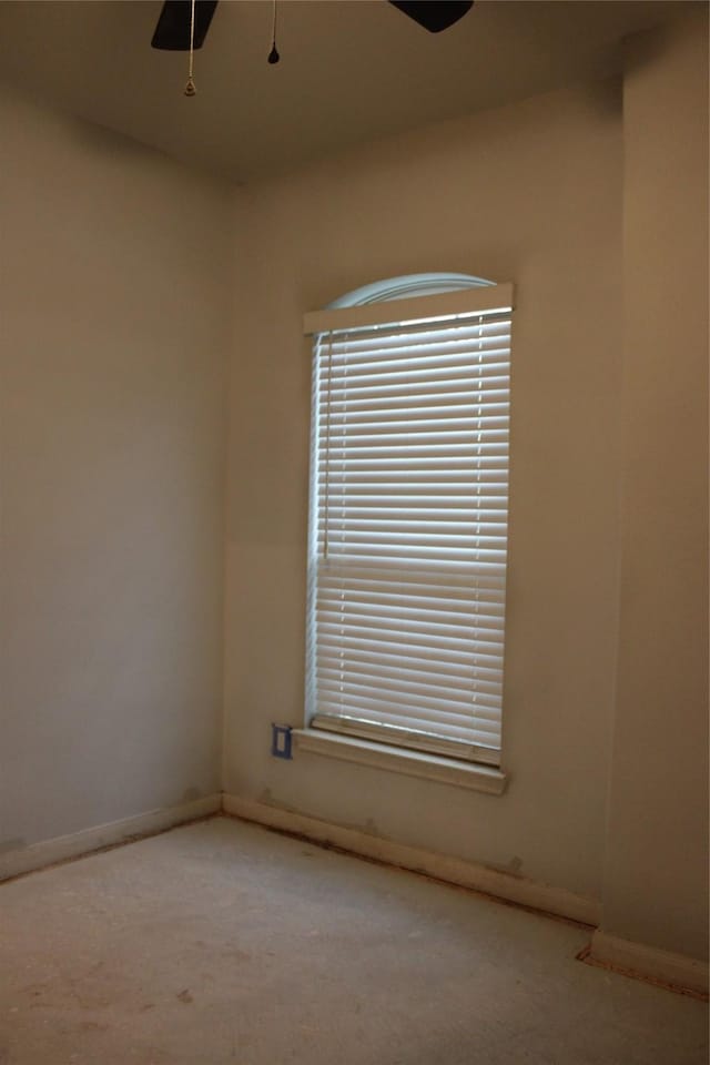 unfurnished room with ceiling fan