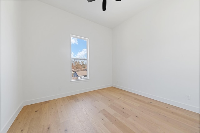 empty room featuring light hardwood / wood-style flooring and ceiling fan