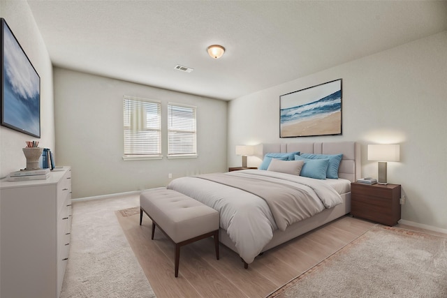 bedroom featuring light wood-type flooring