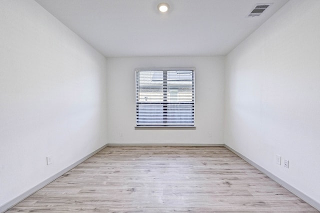 empty room featuring light hardwood / wood-style floors