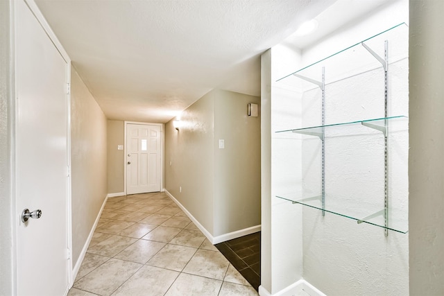 interior space with light tile patterned floors