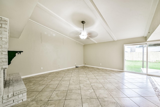 unfurnished living room with ceiling fan and light tile patterned flooring