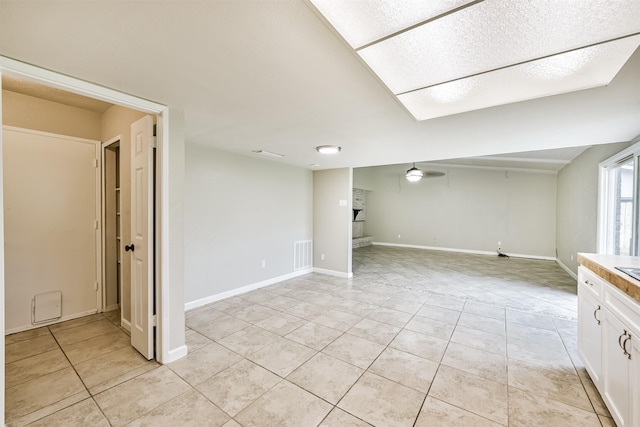 basement with light tile patterned floors