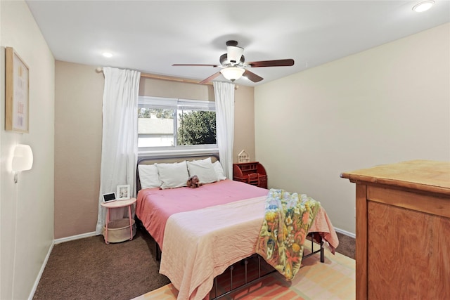 carpeted bedroom featuring ceiling fan