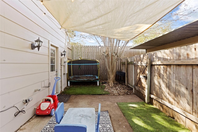 exterior space with a patio area and a trampoline