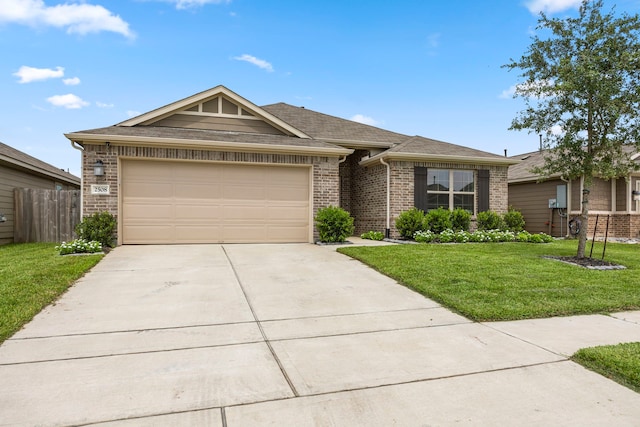 single story home with a garage and a front yard