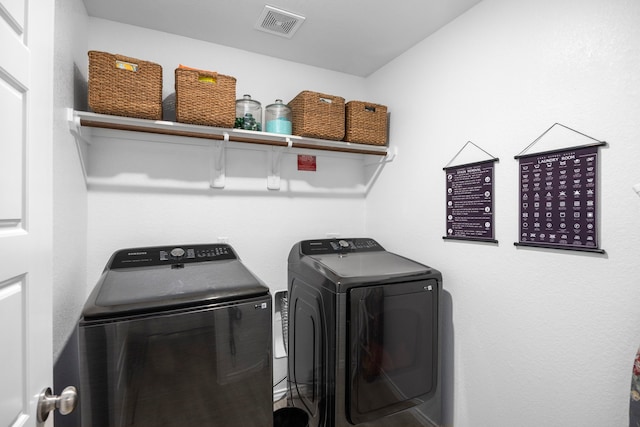 laundry area with washer and dryer