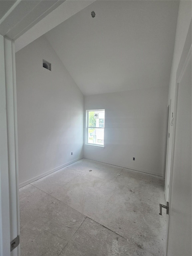9630 Burden St, Houston, TX 77093 - spare room featuring vaulted ceiling and baseboards