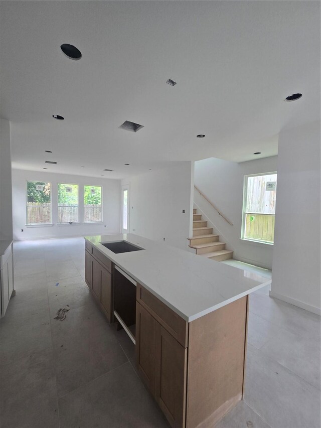 9630 Burden St, Houston, TX 77093 - kitchen featuring open floor plan, healthy amount of natural light, black electric cooktop, a spacious island, and recessed lighting
