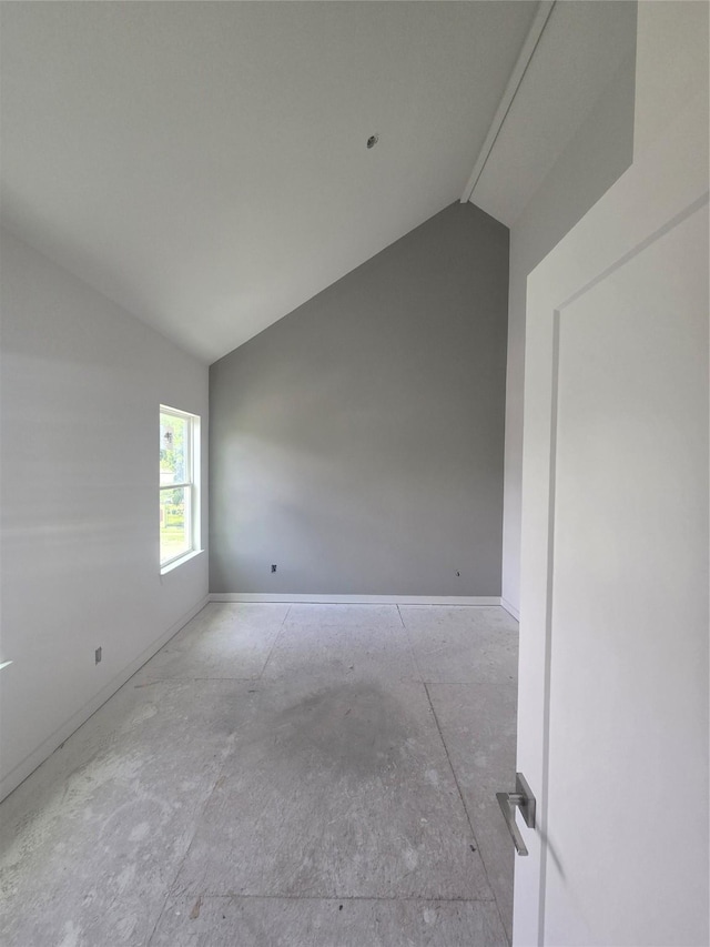 9630 Burden St, Houston, TX 77093 - unfurnished room with lofted ceiling and baseboards