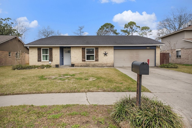 ranch-style home featuring a garage and a front lawn