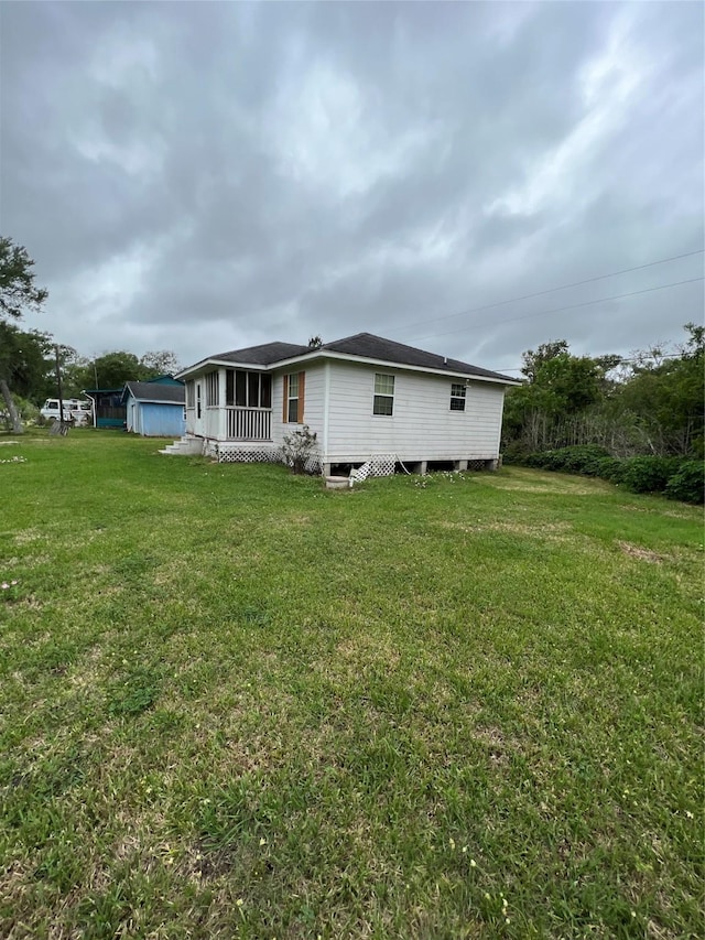 view of property exterior featuring a yard