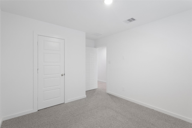 unfurnished room with carpet floors