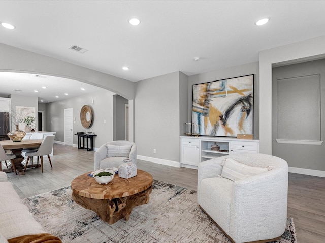 living room featuring light wood-type flooring