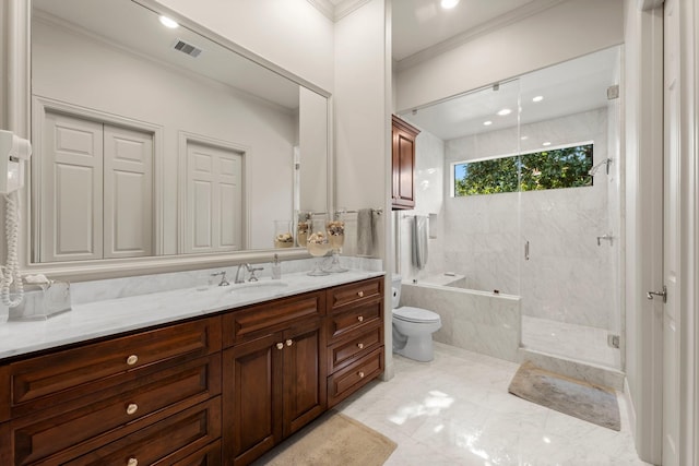 full bathroom with vanity, crown molding, toilet, and separate shower and tub