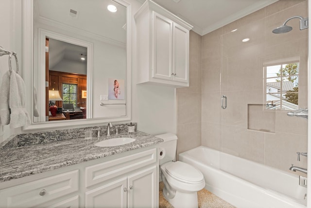 full bathroom with toilet, crown molding, vanity, plenty of natural light, and enclosed tub / shower combo