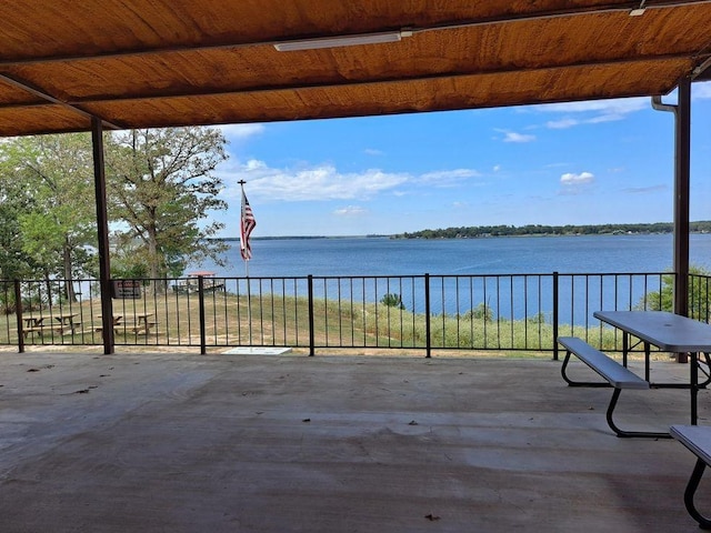 view of patio / terrace with a water view