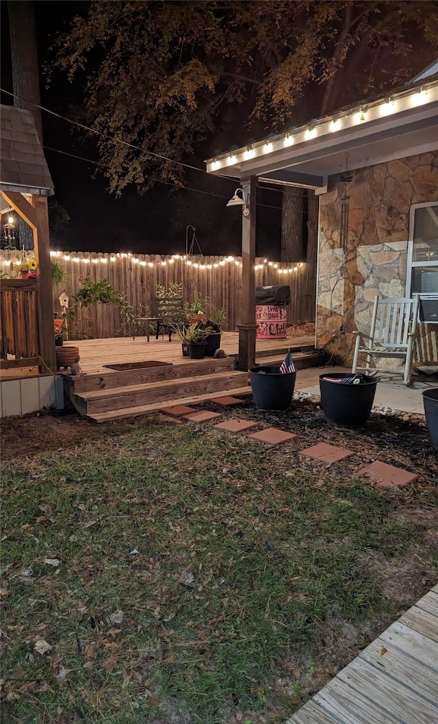 view of yard with a wooden deck