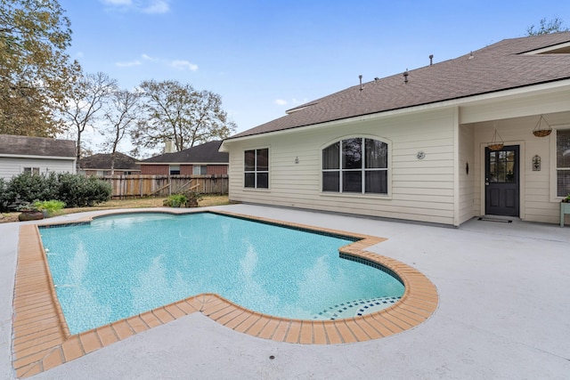 view of swimming pool featuring a patio area