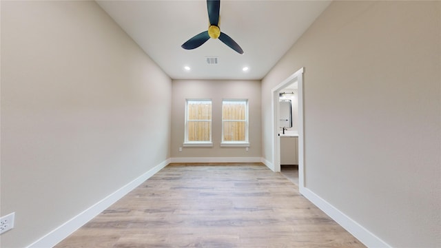 unfurnished bedroom featuring ceiling fan and light hardwood / wood-style flooring