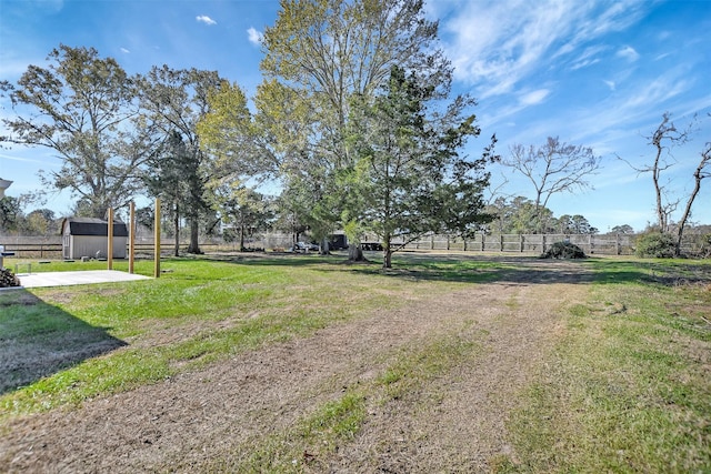 exterior space with a storage shed