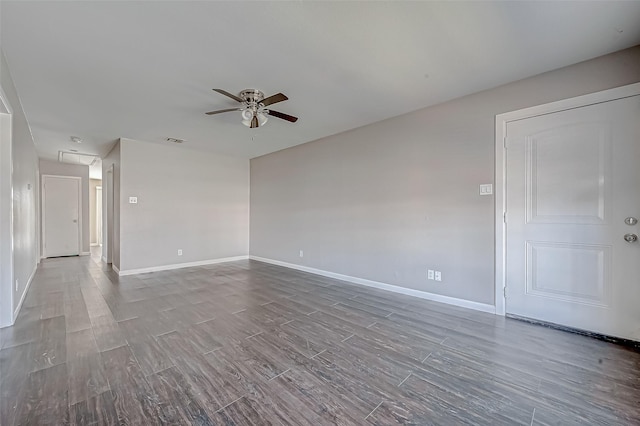 empty room with ceiling fan and hardwood / wood-style floors