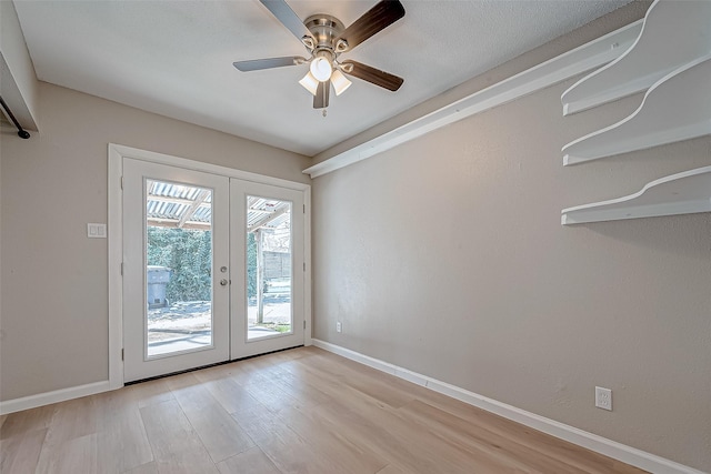 doorway to outside with light hardwood / wood-style flooring, french doors, and ceiling fan