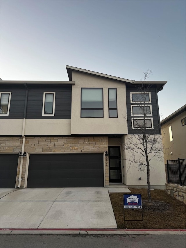 view of front of property featuring a garage