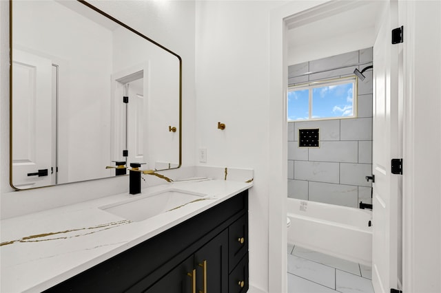 full bathroom with tiled shower / bath combo, vanity, and toilet