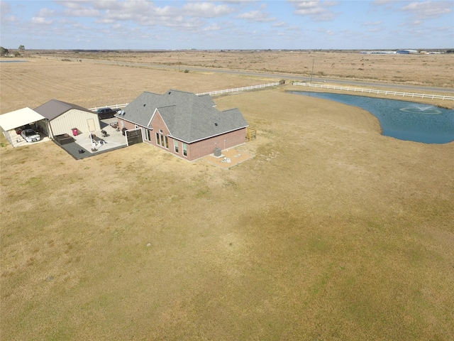 birds eye view of property featuring a rural view