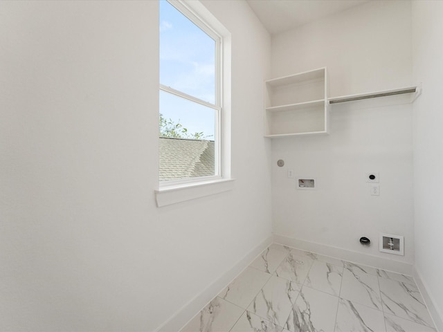 washroom featuring plenty of natural light, hookup for an electric dryer, hookup for a gas dryer, and hookup for a washing machine