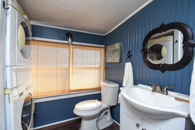 bathroom with crown molding, vanity, toilet, and wood-type flooring