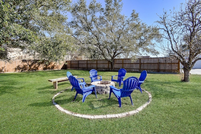 view of yard featuring an outdoor fire pit