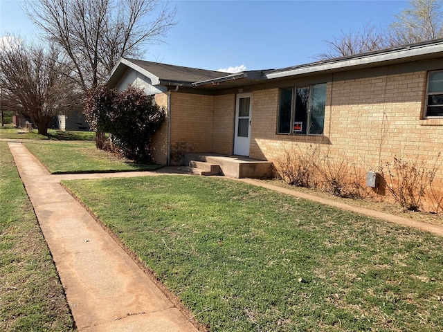 view of front of property with a front lawn