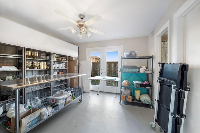 storage area with french doors and ceiling fan