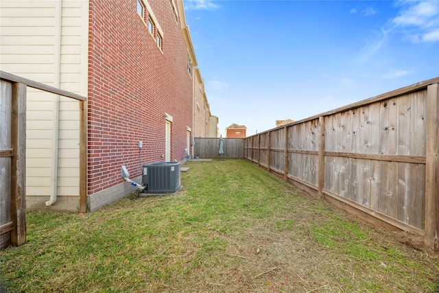 view of yard with central AC unit